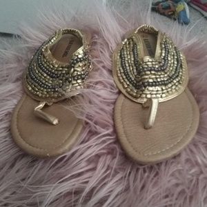 "Gold snadals"